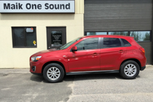 Red 2015 Mitsubishi RVR with professional automotive window film